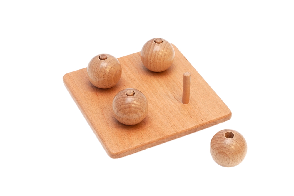 Wooden Balls on Small Pegs